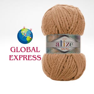 May include: A ball of tan Alize Softy Plus baby yarn. The yarn is wrapped with a label that reads "Baby Alize Softy Plus". The image also includes the text "GLOBAL EXPRESS" with a globe graphic.