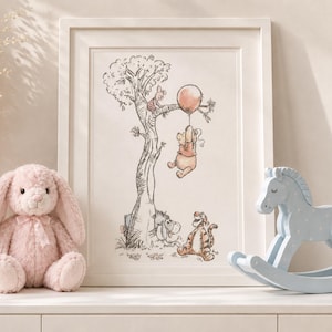 May include: A framed wall art print featuring a classic ink and watercolour illustration of Winnie the Pooh characters. The artwork depicts Pooh holding a balloon, Piglet in a tree, Tigger, and Eeyore. The print is housed in a simple white frame.