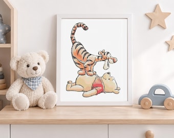 May include: A white framed wall art print featuring a classic illustration of a tiger standing on the back of a yellow bear. The tiger has orange fur with black stripes, and the bear wears a red shirt. The artwork is presented in a simple frame.