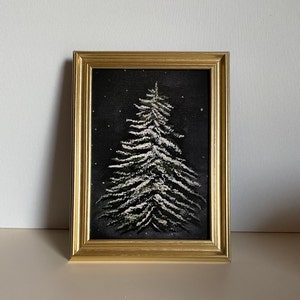 Snow covered tree. Art Print.