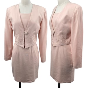 May include: A set of three ceramic mugs with a speckled, matte finish. The mugs are in shades of cream, light gray, and dark gray. Each mug has a simple, minimalist design, perfect for coffee or tea.