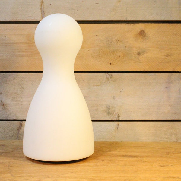 post modern, playful outdoor lamp in the shape of a pawn.