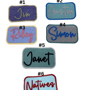 May include: Six embroidered patches with different names, including "Jin", "Austin", "Riley", "Simon", "Janet", and "Natives". The patches are rectangular and have a variety of colours, including blue, green, grey, and pink.