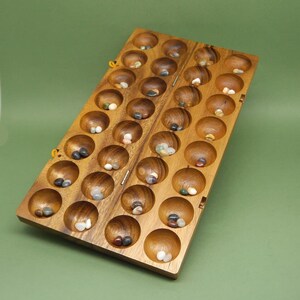 HUS BAO - jeu de gros cailloux image 3