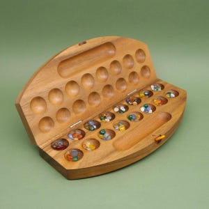 HUS BAO - foldable pebble game image 1