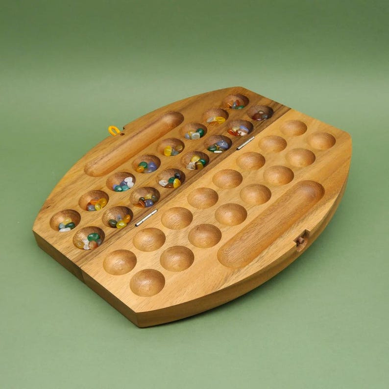 HUS BAO - foldable pebble game image 3