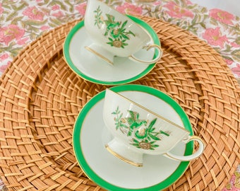 set of two - green/gold chinoiserie bird & flower teacup/saucer set - vintage koran china hand painted in japan style krn5 - diameter 5 1/2"
