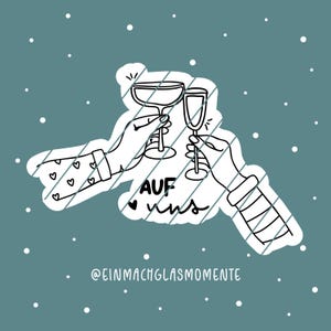 May include: A black and white illustration of two hands toasting with champagne glasses. The image includes the German phrase "Auf uns" and the text "@EINMACHGLASMOMENTE" on a teal background with white dots.