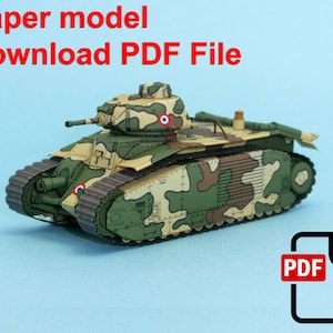 May include: Paper model of a French tank in camouflage colors. The model is made of paper and is ready to be assembled. Download the PDF file to build your own tank.