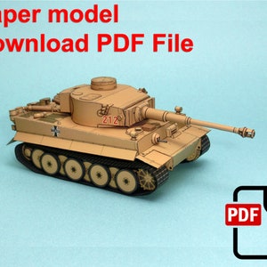 May include: A paper model of a German Tiger tank, painted in a desert camouflage pattern. The model is labeled "212" and features a detailed design. Download the PDF file to build your own.