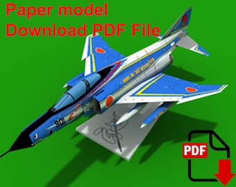 May include: A blue and white paper model of a fighter jet with Japanese markings. The model is labeled "Paper model Download PDF File".