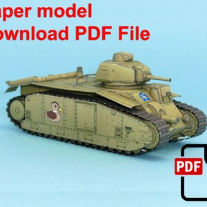 May include: A paper model of a green tank with a duck on the side. The tank is on a blue background. The text "Paper model Download PDF File" is at the top of the image. A PDF icon with a download arrow is in the bottom right corner.