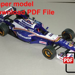 May include: A paper model of a blue and white Formula 1 racing car with the words "Rothmans" and "Elf" on the side. The text "Download PDF File" is in red at the top of the image. A red download arrow with the word "PDF" is in the bottom right corner.