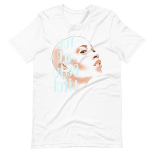 May include: White t-shirt with a light blue graphic of a woman's face and the text "You are beautiful".