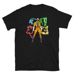 May include: Black t-shirt with a graphic of a superhero standing in the center of a circle of animals. The animals are a wolf, a bear, a bird, and a panther. The superhero is wearing a yellow and red costume and has a red cape.