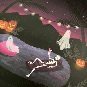 May include: A spooky Halloween illustration of a skeleton relaxing in a pool with a cocktail, a ghost floating in a pink inflatable ring, and another ghost swinging on a swing. The scene is set at night with palm trees, string lights, and jack-o-lanterns.