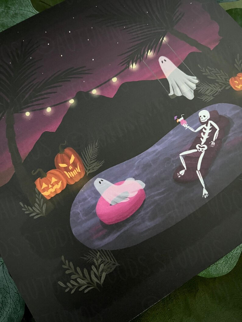 May include: A spooky Halloween pool party scene with a skeleton in a pool float, a ghost on a swing, and pumpkins. The scene is set at night with a purple sky and string lights.