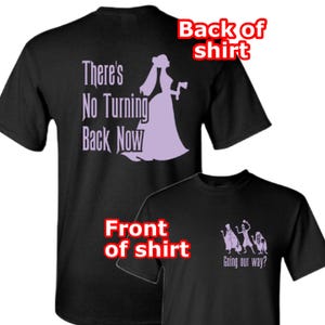 May include: Black t-shirts with a lavender graphic. One shirt features a silhouette of a woman and the text "There's No Turning Back Now." The other shirt has a graphic of three figures and the text "Going our way?"