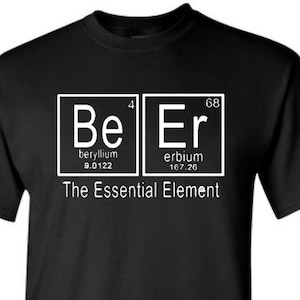 May include: Black t-shirt with a white graphic of the periodic table elements Beryllium (Be) and Erbium (Er) with the text "The Essential Element".
