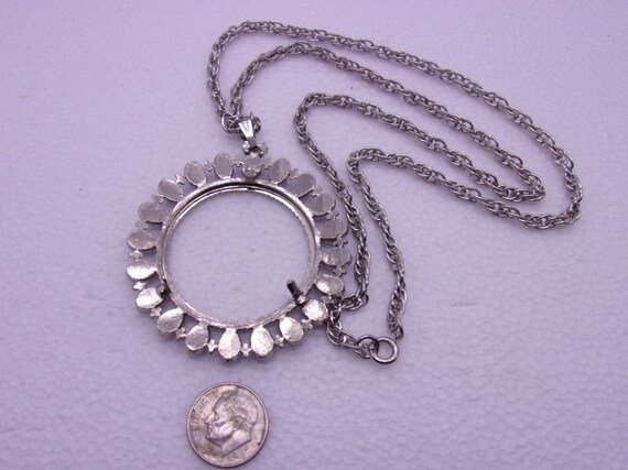 Silver dollar coin holder best sale necklace
