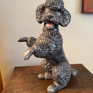 Vintage ceramic begging poodle figure
