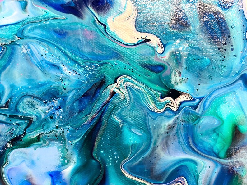 May include: Abstract painting with swirling blue, teal, and white paint. The paint has a marbled effect and creates a sense of movement.