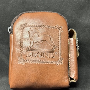 May include: A set of three ceramic mugs with a speckled, matte finish. The mugs are in shades of cream, light gray, and dark gray. Each mug has a simple, minimalist design, perfect for coffee or tea.