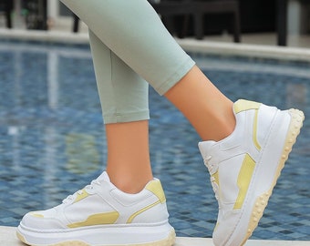 mustard platform sneakers