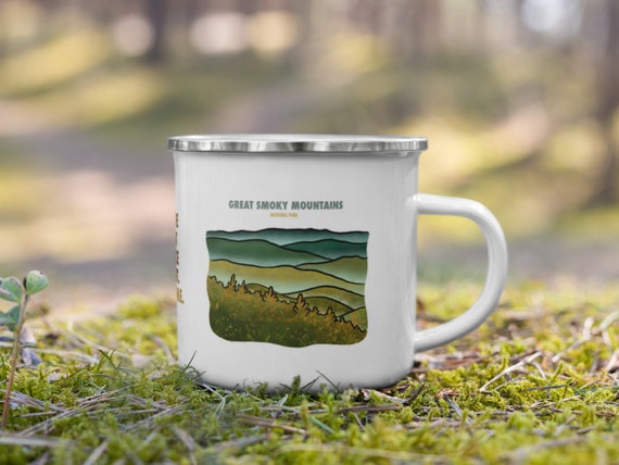 Vintage enamel mug with Great Smoky Mountains design showcasing classic camping aesthetic