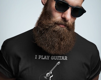 May include: A man wearing sunglasses and a black t-shirt with the text "I play guitar and I know things" and a graphic of a guitar.