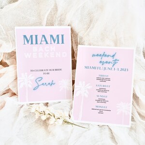 May include: Two pink cards with white palm trees and blue text. The first card says "Miami Bach Weekend" and "To celebrate our bride to be Sarah". The second card says "Weekend Event Miami FL June 1-3, 2023" and lists the activities for each day.