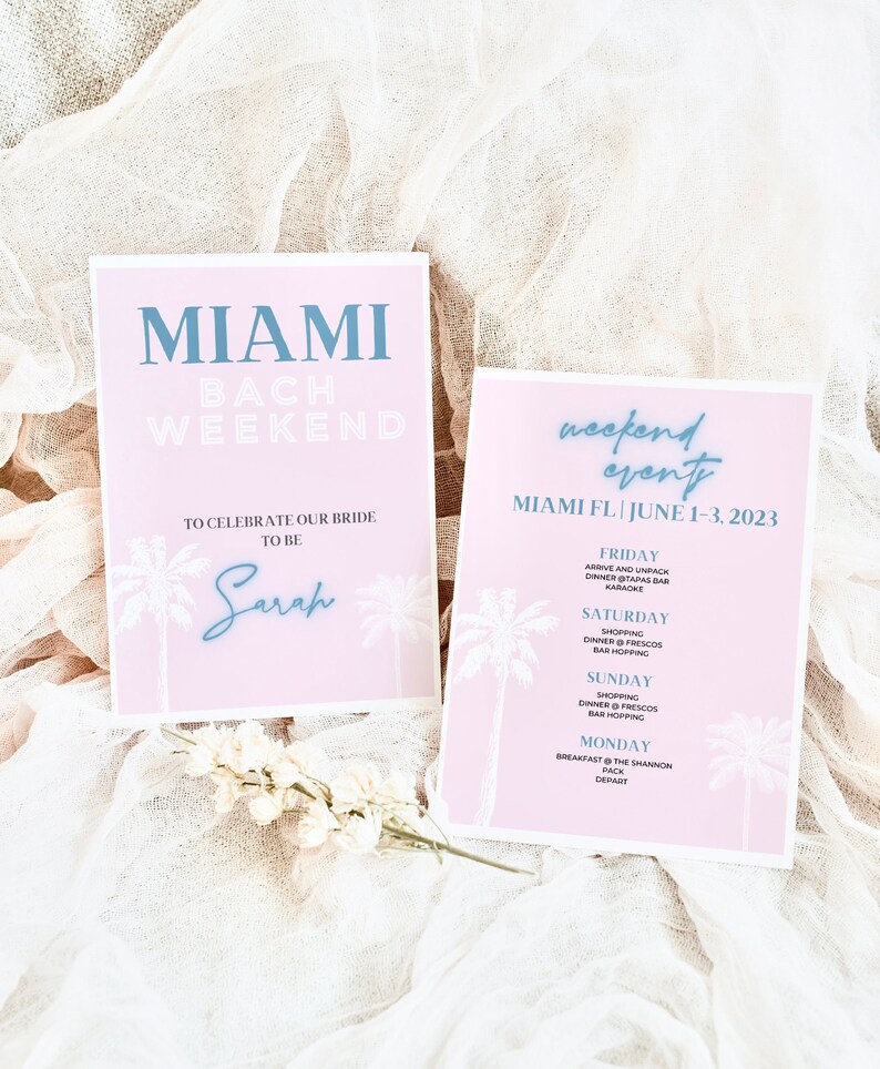 May include: Two pink cards with white palm trees and blue text. The first card says "Miami Bach Weekend" and "To celebrate our bride to be Sarah". The second card says "Weekend Event Miami FL June 1-3, 2023" and lists the activities for each day.