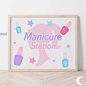 May include: A pink and purple printable sign with the text "Manicure Station" and images of nail polish bottles and stars. The sign is framed in a light wood frame. Sizes provided: 10 x 8" and 7 x 5".
