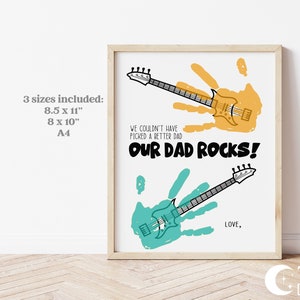 May include: A printable Father's Day card with a handprint design and the text "We couldn't have picked a better dad. Our Dad Rocks!" in black and yellow text. The handprint is shaped like a guitar. The card is available in three sizes: 8.5 x 11 inches, 8 x 10 inches, and A4.