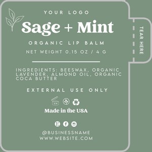 May include: Sage + Mint Organic Lip Balm label with a green background and white text. The label includes the ingredients, net weight, and instructions for external use only. It also includes a 12M symbol, a recycling symbol, and the text "Made in the USA".