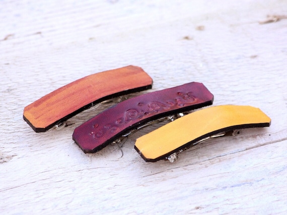 Three small leather hair clips, set of leather barrettes in yellow, orange and red