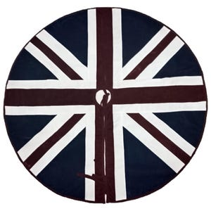 May include: A round tree skirt featuring the Union Jack flag design. The skirt has a navy blue background with white and burgundy stripes. The center has a small opening with a tie closure.