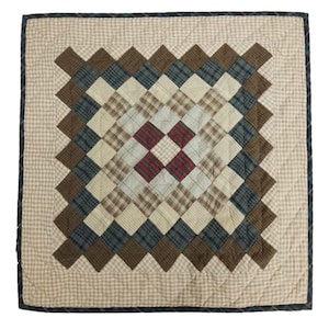 May include: Square quilted throw blanket with a diamond pattern. The center features a red and white plaid design, surrounded by alternating squares of brown, blue, and cream plaid. The border is a tan and white gingham check, with a dark blue trim.