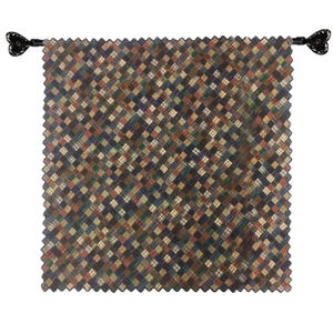 May include: A brown and black patchwork quilt wall hanging with a scalloped edge and black tassels.