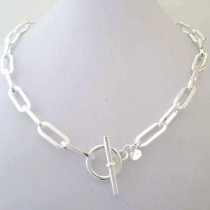 Solid 925 silver necklace, 8.5 mm paperclip chain, large square wire. Length 45 cm, 62 grams. Toggle clasp, T-bar.