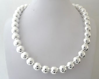 Necklace in 925 silver spheres diameter 12 mm. Length 45 cm, weight 85 grams. Made in Tuscany!