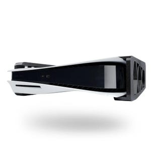 May include: A white and black gaming console with a black stand. The console features a curved design with a black centre and white sides. The stand is black and has a rectangular shape with multiple openings.