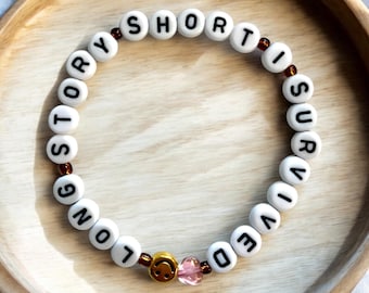 Long story short I survived evermore swiftie friendship bracelet in black