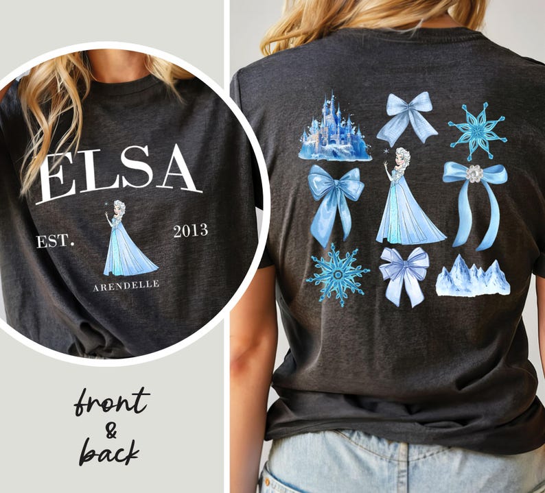 May include: Dark gray t-shirt with a front graphic of "ELSA" and a princess illustration. The back features a castle, bows, snowflakes, and a princess in a blue dress. The text "EST. 2013 ARENDELLE" is also visible.