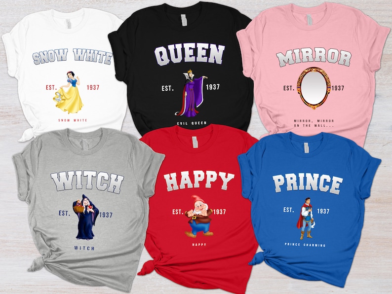 May include: Six different t-shirts featuring characters from the classic Disney movie Snow White and the Seven Dwarfs. The shirts are in various colors, including white, black, pink, gray, red, and blue. Each shirt features a different character, including Snow White, the Evil Queen, the Magic Mirror, the Witch, Happy, and Prince Charming. The shirts all have the same design, with the character's name in a large, white font and the year 1937 printed below.