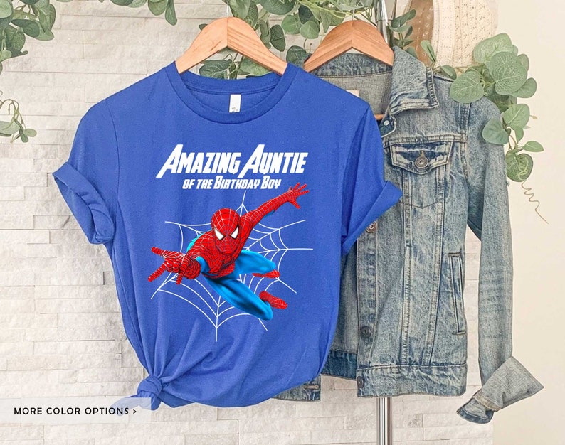May include: Blue t-shirt with the text "Amazing Auntie of the Birthday Boy" and a cartoon image of Spiderman in a web.
