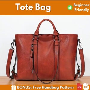 Op de afbeelding: Een roodbruine tote bag met een handvat aan de bovenkant en een afneembare schouderriem. De tas heeft een rechthoekige vorm en metalen hardware. De tekst "Tote Bag" staat bovenaan, met "Beginner Friendly" ernaast.