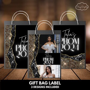 May include: Three gift bag labels with a black background and gold glitter accents. The labels feature a photo of a person in a white dress and the text "Talia's Prom 2024".