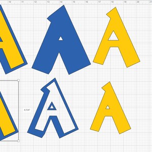 Puede incluir: Seis letras may&uacute;sculas A de diferentes tama&ntilde;os, cuatro son amarillas con un contorno azul y dos son azules con un contorno blanco. Las letras est&aacute;n dispuestas en dos filas de tres.