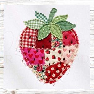May include: A strawberry-shaped fabric ornament featuring a patchwork design of red, pink, and cream cotton squares with various patterns including gingham, hearts, and floral prints. The piece has green fabric leaves and black embroidered seeds.